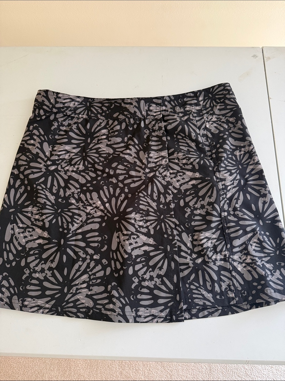 Ripskirt Hawaii Black Mini Skirt with Gray Floral Burst Print